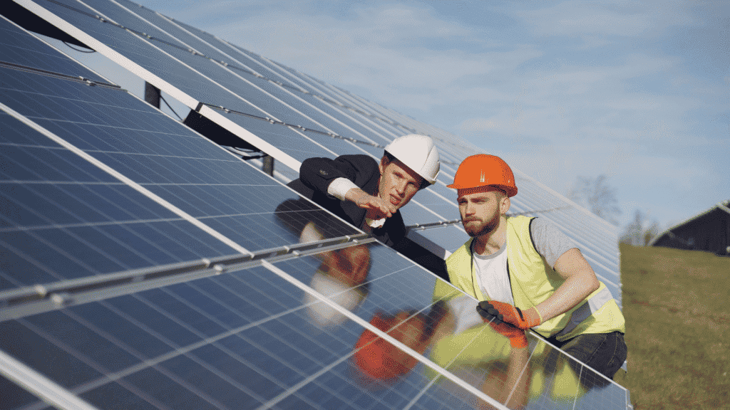 Specialist evaluating the performance of energy-saving systems during post-installation monitoring.