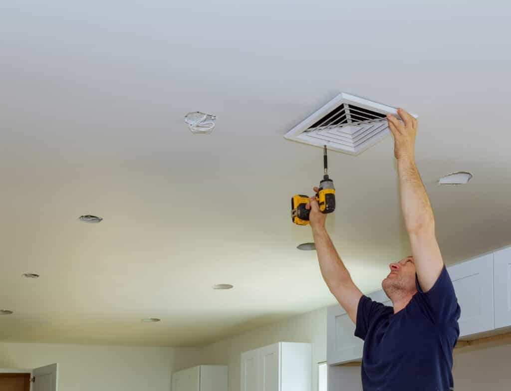 Expert performing ventilation assessment services on a commercial building retrofit project.