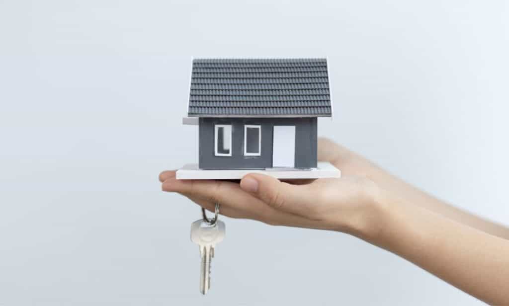 Leicester property surveyor using specialized equipment to assess energy performance.